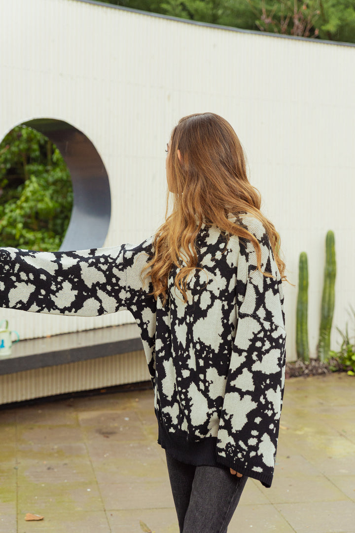 SWEATER VACA - NEGRO CRUDO